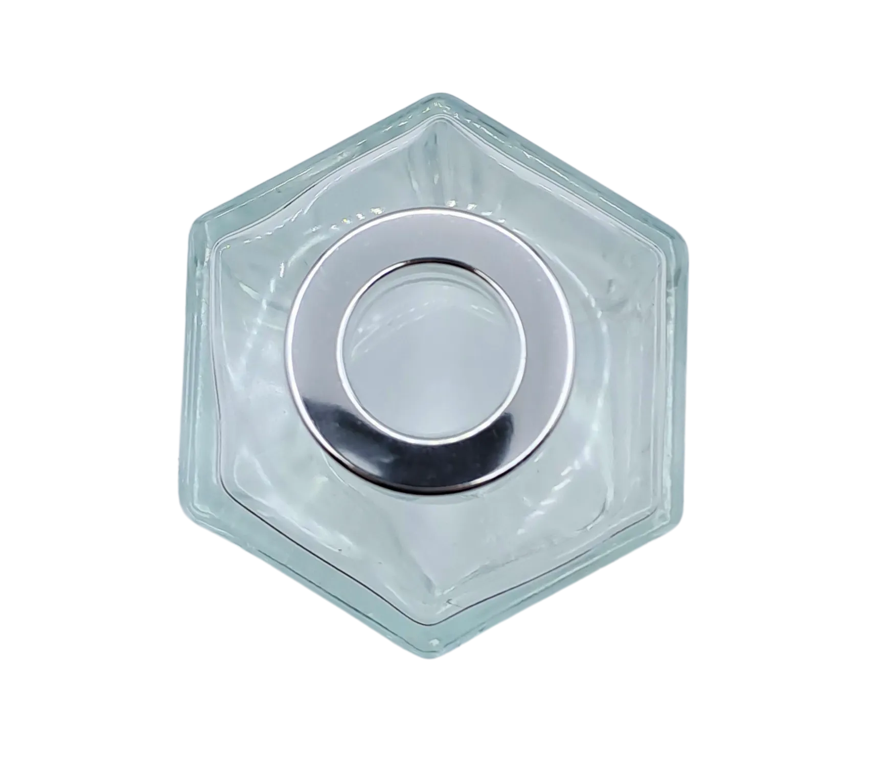 Bote 100 ml hexagonal transparente con tapón plateado para recarga de mikado. Plano cenital