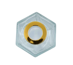 Bote 100 ml hexagonal transparente con tapón dorado para recarga de mikado. Plano cenital