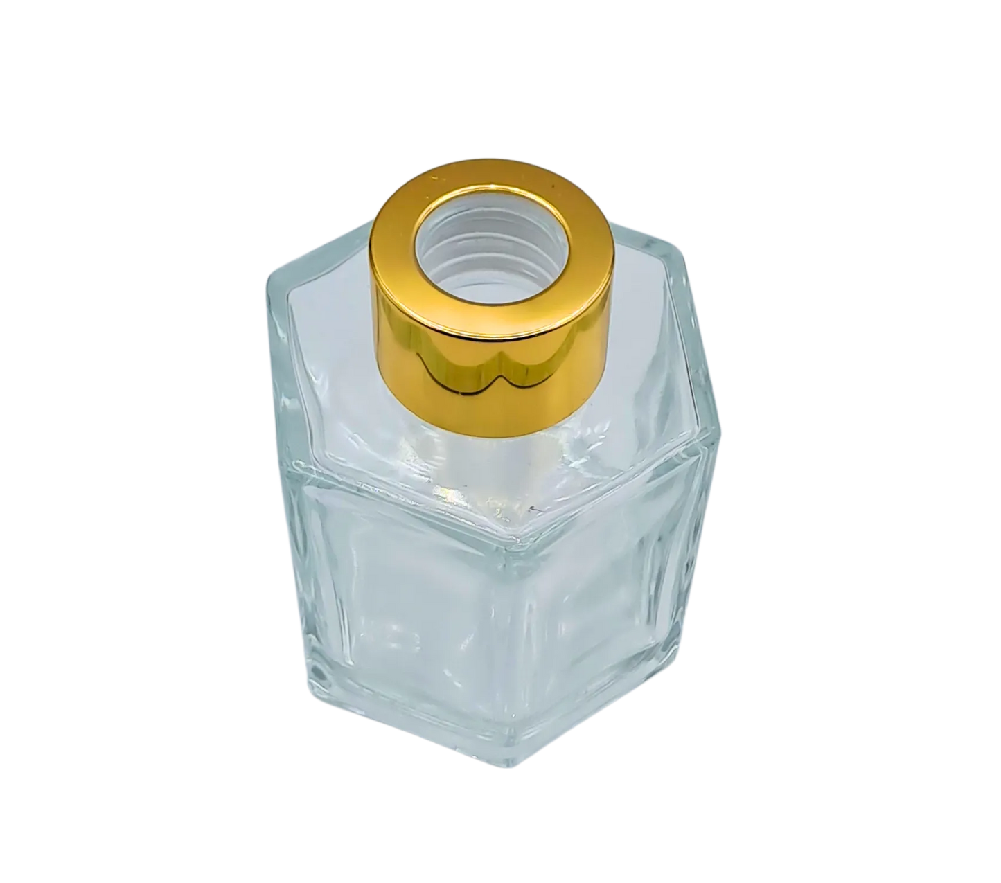 Bote 100 ml hexagonal transparente con tapón dorado para recarga de mikado