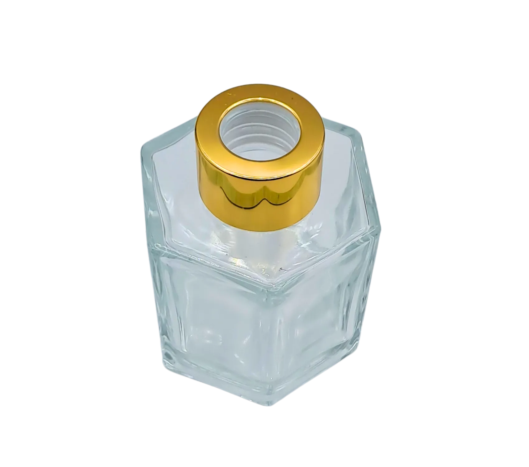 Bote 100 ml hexagonal transparente con tapón dorado para recarga de mikado