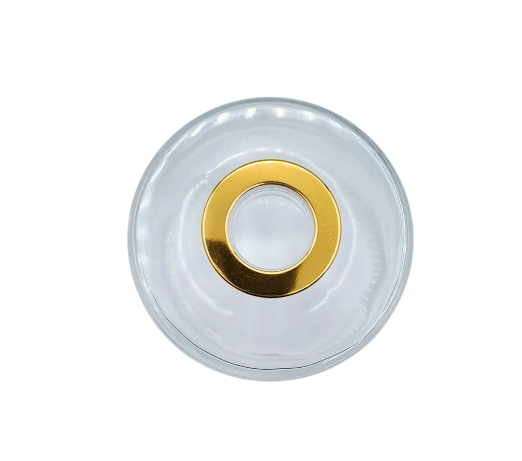 Bote 120 ml redondo transparente con tapón dorado para recarga de mikado. Plano cenital